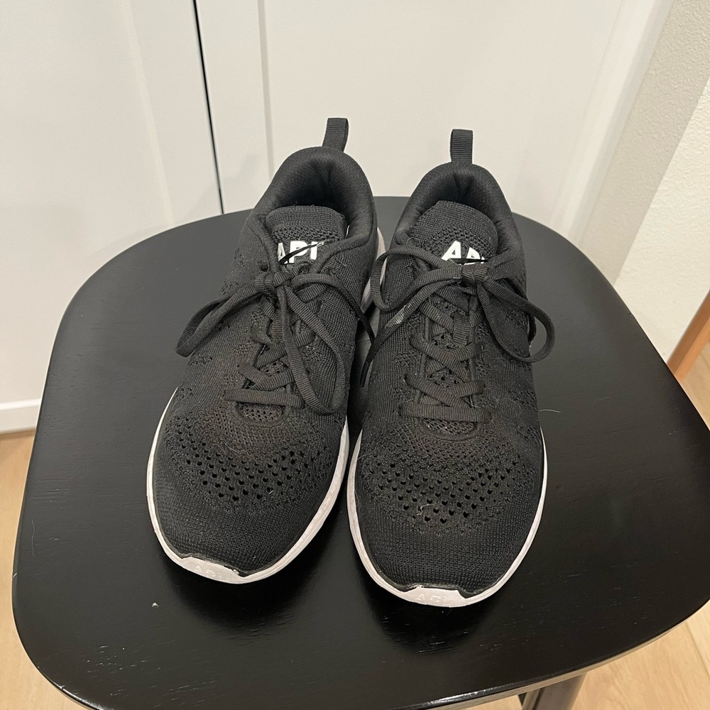Lightly used black APL sneakers